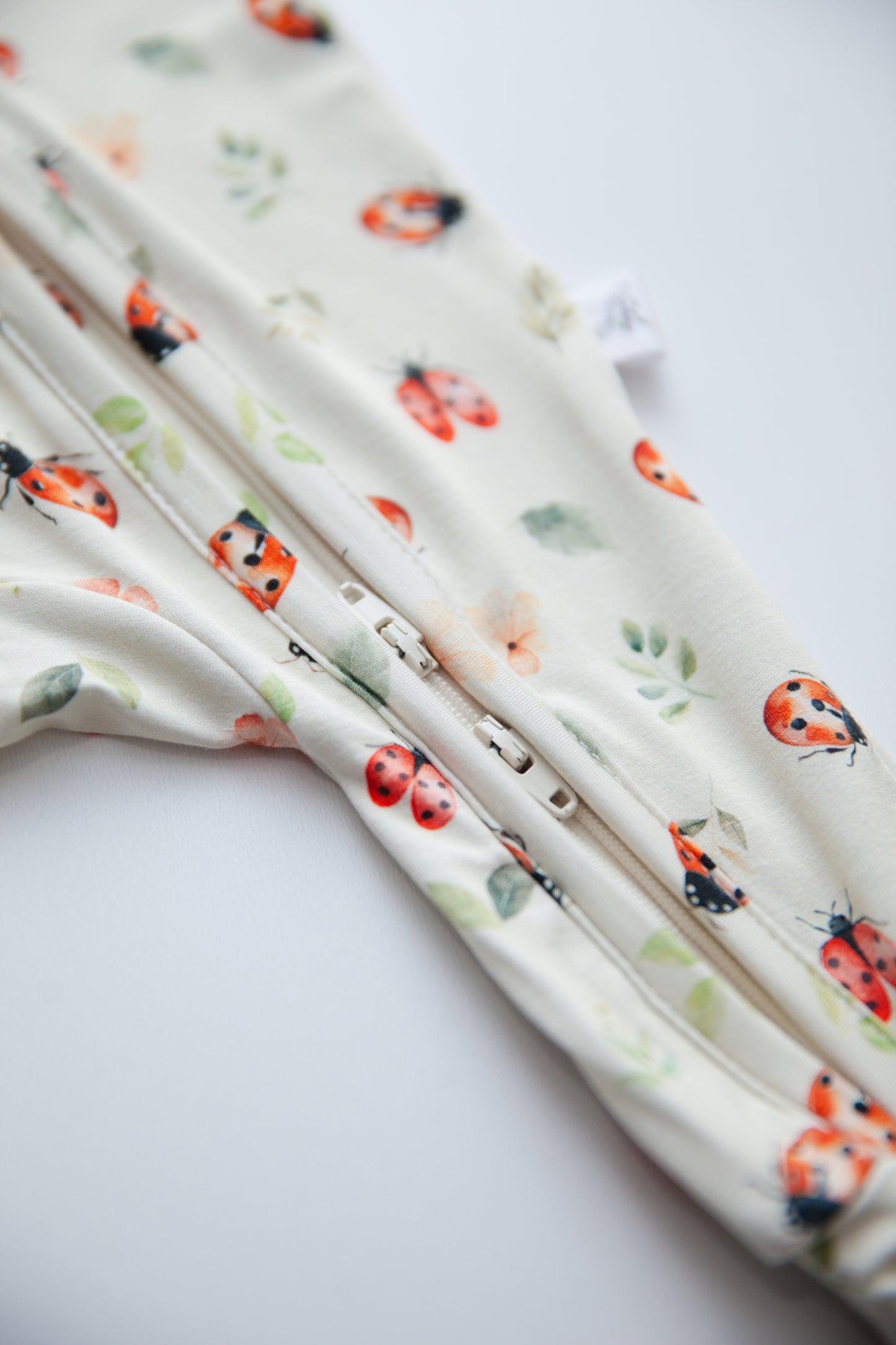 Zippered Romper in Bug Hug